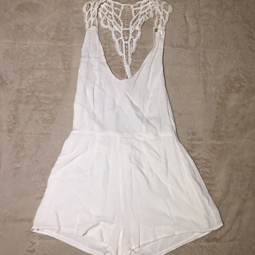 White romper with open back